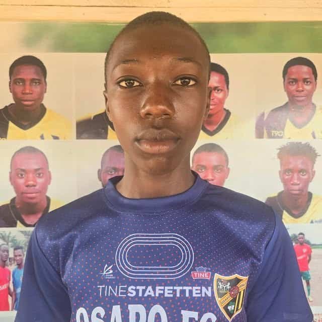 - Young athlete in Osaro Intl Sports Academy soccer jersey, focused and dedicated.