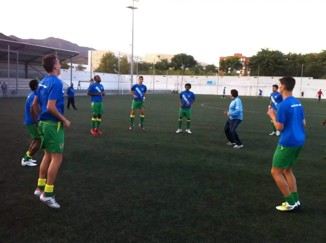 Young athletes training at Osaro International Sports Academy soccer field.