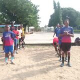 Young athletes training outdoors at Osaro Intl Sports Academy.